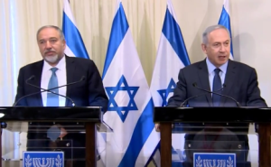 Yisrael Beytenu leader Avigdor Leiberman and Prime Minister Benjamin Netanyahu, announcing their coalition agreement. Photo: Facebook/Screenshot.