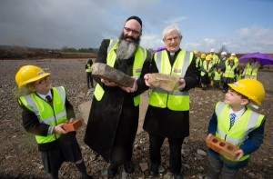 Jewish & Catholic clerics at the site of a new joint faith campus in Scotland. Photo: Twitter.