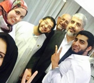 Aayesha J. Soni (top left) poses with Hamas leader Khaled Meshaal. Photo; Twitter. 