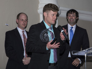 Adam Shepherd (center) accepts his award from the Bnai Zion Foundation at Bnai Zion's Texas Region Spring Reception last month in Dallas. Photo: Courtesy Bnai Zion.