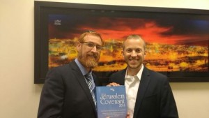 Rabbi Tuly Weisz (right) presents Member of Knesset Yehuda Glick with the Jerusalem Covenant. Photo: Israel365.