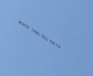 A plane with a banner that says, "America, Israel feels your pain" flew over downtown Orlando. Photo: Facebook/StandWithUs