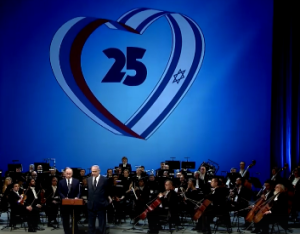 Israeli Prime Minister Benjamin Netanyahu (right) with Russian President Vladimir Putin at the Boshoi Theater in Moscow on Tuesday night. Photo: Facebook/screenshot.
