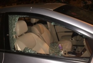 A vehicle whose windows were smashed by terrorists in Tuesday's overnight terror attack on Route 443 between Tel Aviv and Jerusalem. Photo: IDF Spokesperson's Unit.