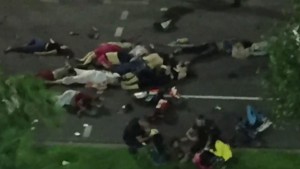 Dead bodies at the scene of the attack in Nice. The driver behind the attack has been named as a convicted criminal. Photo: Twitter. 