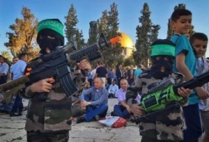 Palestinian youth posing as Hamas terrorists on Temple Mount. Photo: Lach Yerushalayim. 