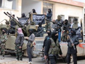 Nusra Front fighters in Syria. The terror group announced that it is dropping its affiliation with al-Qaeda. Photo: Wikimedia Commons.