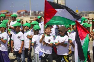 Young children in Gaza seen taking part in the opening of a Hamas summer camp. Photo: Hamas.
