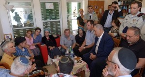 Israeli Prime Minister Benjamin Netanyahu, right center, paid condolences to the family of the late Hallel Yaffa Ariel. He promised the strengthen the settlement were Ariel lived. Photo: Twitter.
