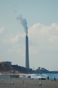 Coal powered electric generating facility, south of a municipal beach Photo: David King from Haifa, Israel via Wikimedia Commons.