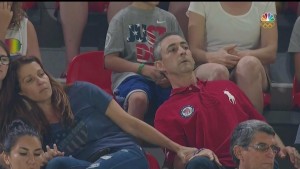 Aly Raisman's parents watching her compete on Sunday. Their poses and facial reactions garnered social media attention. Photo: Twitter.