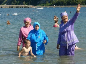 Muslim women wearing burkinis. Photo: Wikipedia.