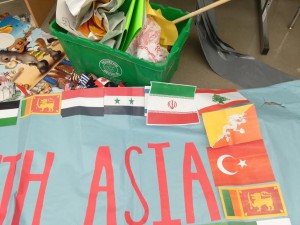 The flag of Israel covered up by the Iranian flag. Photo: StandWithUs. 