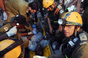 Israeli rescuers extract a trapped man in Port-au-Prince following the January 2010 earthquake in Haiti. Photo: IDF.