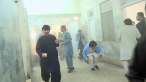 People running for cover inside the Pakistani hospital where there was a suicide bombing. Photo: Twitter.