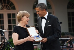 German Chancellor Angela Merkel receiving the Medal of Freedom from US President Barack Obama in 2011. Photo: Wikimedia Commons.