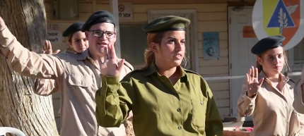 Special-needs Israelis performing Hatikvah in sign language at their IDF basic training graduation. Photo: Screenshot.