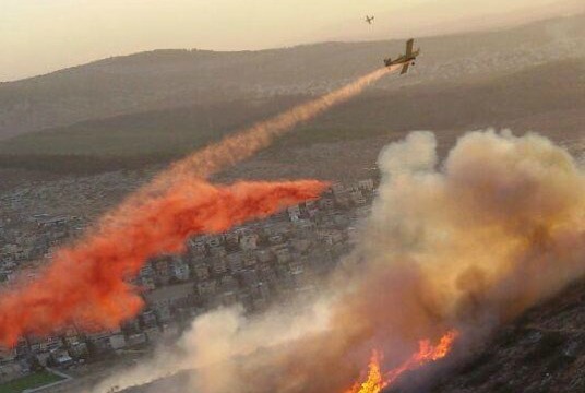 Israeli firefighting planes battle a blaze. Photo: Prime Minister Benjamin Netanyahu's Facebook page.