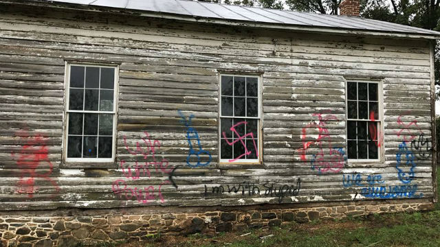 Racist and antisemitic graffiti seen spray-painted on the historic Ashburn Colored School. Photo: Ashburn Old School Rehabilitation/ Facebook.