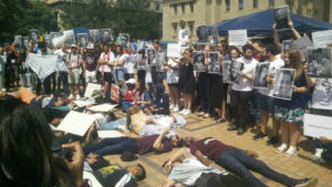 Pro-Israel and Jewish students at Wit University hold a silent protest in response to a BDS die-in on campus. Photo: Gilad Kabilo.